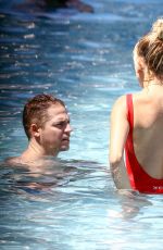 HAILEY BALDWIN in Swimsuit at a Pool in Miami 06/12/2016