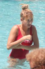 HAILEY BALDWIN in Swimsuit at a Pool in Miami 06/12/2016