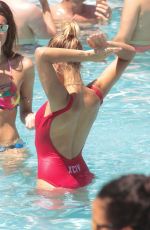 HAILEY BALDWIN in Swimsuit at a Pool in Miami 06/12/2016
