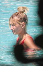 HAILEY BALDWIN in Swimsuit at a Pool in Miami 06/12/2016