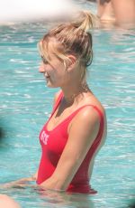 HAILEY BALDWIN in Swimsuit at a Pool in Miami 06/12/2016