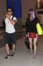JULIETTE LEWIS at LAX Airport in Los Angeles 06/22/2016