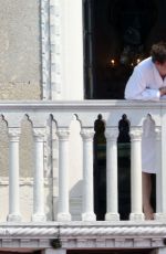 KATE MOSS on Her Hotel Balcony in Venice 06/26/2016