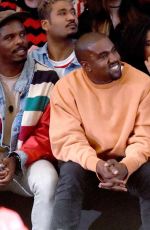 KENDALL JENNER anfd Kanye West at Moschino Resort 2017, Front Row