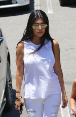 KOURTNEY KARDASHIAN Leaves Hugo
