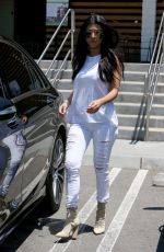KOURTNEY KARDASHIAN Leaves Hugo