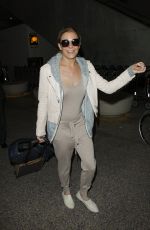 LEANN RIMES at LAX Airport in Los Angeles 06/17/2016