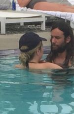 LESHA SEBERT in Bikini at a Pool in Palm Springs 06/18/2016