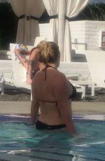 LESHA SEBERT in Bikini at a Pool in Palm Springs 06/18/2016