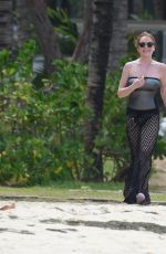 LINDSAY LOHAN and Egor Tarabasov on Romantic Beach Stroll in Port Louis 06/14/2016