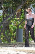 LINDSAY LOHAN and Egor Tarabasov on Romantic Beach Stroll in Port Louis 06/14/2016