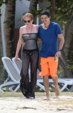 LINDSAY LOHAN and Egor Tarabasov on Romantic Beach Stroll in Port Louis 06/14/2016