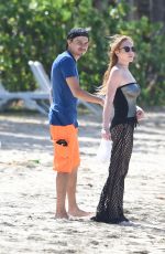 LINDSAY LOHAN and Egor Tarabasov on Romantic Beach Stroll in Port Louis 06/14/2016