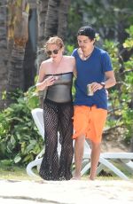 LINDSAY LOHAN and Egor Tarabasov on Romantic Beach Stroll in Port Louis 06/14/2016