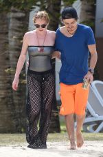 LINDSAY LOHAN and Egor Tarabasov on Romantic Beach Stroll in Port Louis 06/14/2016