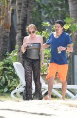 LINDSAY LOHAN and Egor Tarabasov on Romantic Beach Stroll in Port Louis 06/14/2016