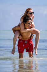 LINDSAY LOHAN in Swimsuit at the Beach in Mauritius 06/21/2016