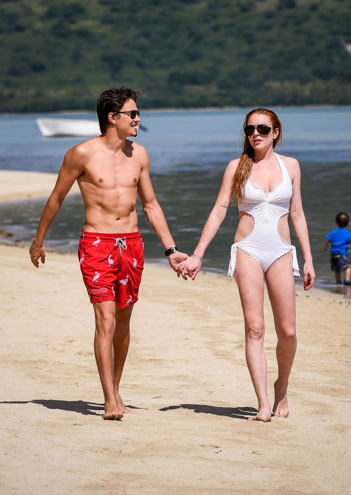 LINDSAY LOHAN in Swimsuit at the Beach in Mauritius 06/21 