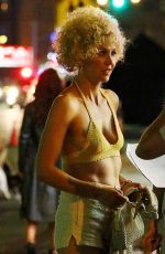 MAGGIE GYLLNHAAL on the Set of The Deuce in New York 06/20/2016