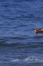 MICHELLE HUNZIKER in Bikini at a Beach in Forte Del Marmi 06/24/2016