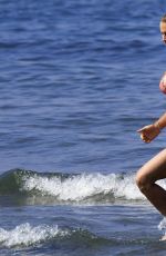 MICHELLE HUNZIKER in Bikini at a Beach in Forte Del Marmi 06/24/2016