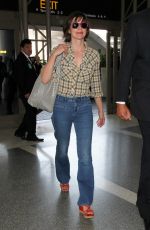 MILLA JOVOVICH at LAX Airport in Los Angeles 06/17/2016