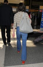 MILLA JOVOVICH at LAX Airport in Los Angeles 06/17/2016