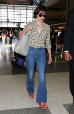 MILLA JOVOVICH at LAX Airport in Los Angeles 06/17/2016