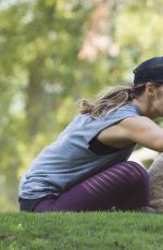 MINKA KELLY with Her Dogs at a Park in Los Angeles 06/23/2016