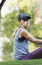 MINKA KELLY with Her Dogs at a Park in Los Angeles 06/23/2016