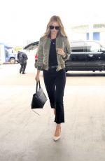 ROSIE HUNTINGTON-WHITELEY at LAX Airport in Los Angeles 06/16/2016