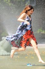 SELENA GOMEZ Running Thru Sprinklers at Water Playground in Brooklyn 06/01/2016