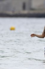 SHAKIRA in Bikini Top at a Beach in Ibiza 05/25/2016