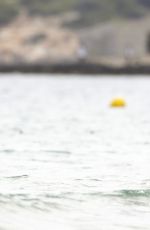SHAKIRA in Bikini Top at a Beach in Ibiza 05/25/2016