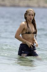 SHAKIRA in Bikini Top at a Beach in Ibiza 05/25/2016