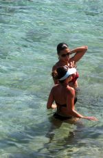 ADRIANA LIMA in Bikini on the Beach in Mykonos 07/10/2016