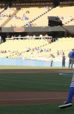 AUBREY PLAZA Throwing Out First Pitch at Dodgers Game in Los Angeles 07/01/2016