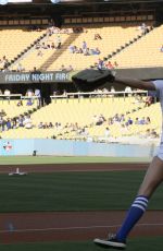 AUBREY PLAZA Throwing Out First Pitch at Dodgers Game in Los Angeles 07/01/2016