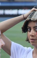 AUBREY PLAZA Throwing Out First Pitch at Dodgers Game in Los Angeles 07/01/2016