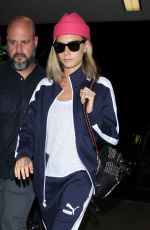 CARA DELEVINGNE Arrives at LAX Airport in Los Angeles 07/27/2016