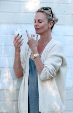 CHARLIZE THERON Out in Los Angeles 07/05/2016