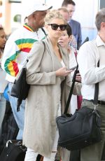 CHARLOTTE MCKINNEY at Pearson International Airport in Toronto 07/11/2016