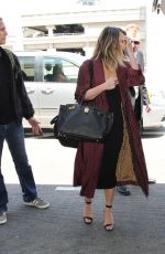 CHRISSY TEIGEN at LAX Airport in Los Angeles 07/08/2016