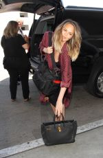CHRISSY TEIGEN at LAX Airport in Los Angeles 07/08/2016