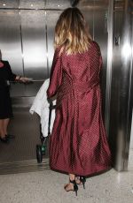 CHRISSY TEIGEN at LAX Airport in Los Angeles 07/08/2016