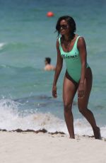 CLAUDIA JORDAN in Swimsuit at a Beach in Miami 07/28/2016