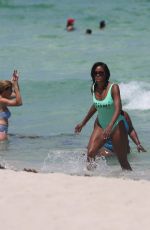 CLAUDIA JORDAN in Swimsuit at a Beach in Miami 07/28/2016