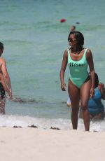 CLAUDIA JORDAN in Swimsuit at a Beach in Miami 07/28/2016