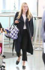 DAKOTA FANNING at Pearson International Airport in Toronto 07/11/2016