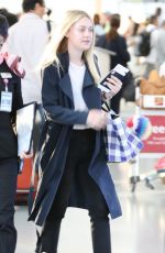 DAKOTA FANNING at Pearson International Airport in Toronto 07/11/2016